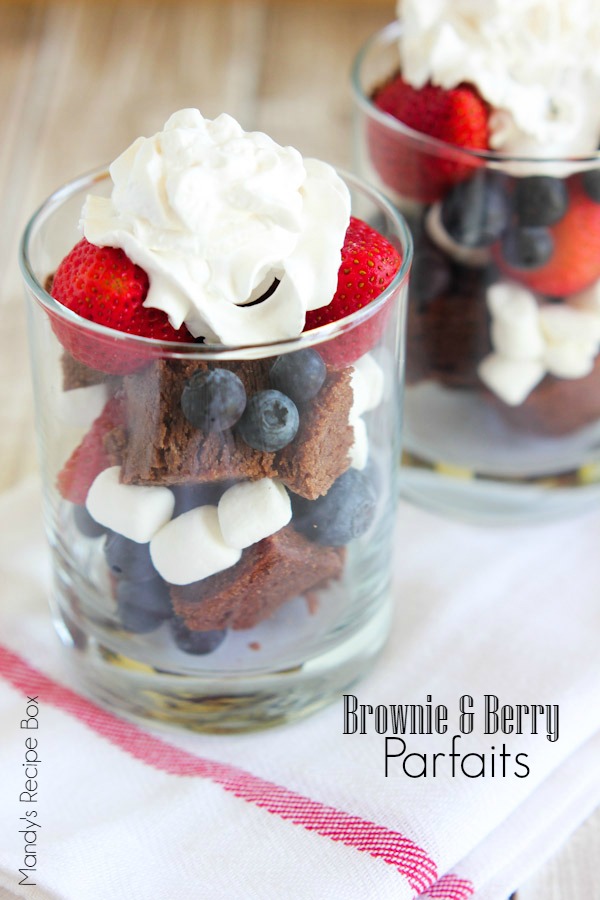 Brownie & Berry Parfaits in glasses with whipped cream.