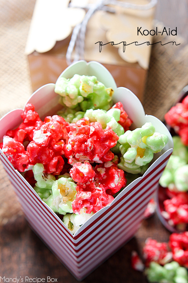 Kool-Aid Popcorn - this is a fun, easy treat to make for and with your kids! The red and green colors are perfect for the holiday season. Kool-Aid has so many flavors the possibilities are endless. Blue for frozen themed popcorn, red and pink for Valentines's Day, green for St. Patrick's day or several light colors to celebrate spring. Popcorn balls would also be fun to make.