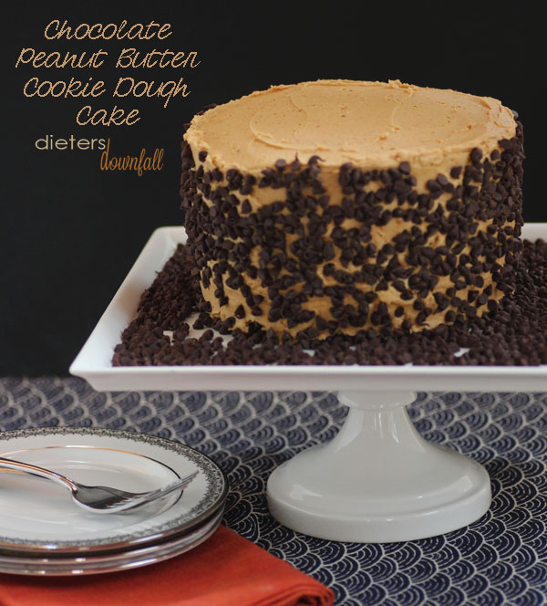 Chocolate Cake piled high sandwiching Peanut Butter Cookie Dough and Peanut Butter Frosting - from dietersdownfall.com
